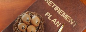 A nest of eggs with the words retirement plan written on it.